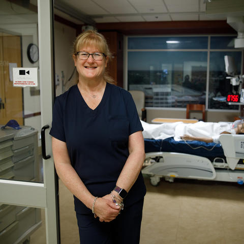 Photo of Lynn Kelso in teaching simulation center
