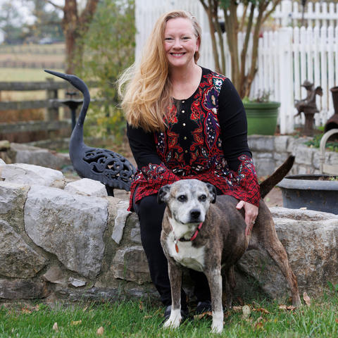 Before receiving an accurate diagnosis and treatment plan, Tina Frazier was unable to do many things she loves like working in her yard and playing with her dog "Pepper". Mark Cornelison | UK Photo