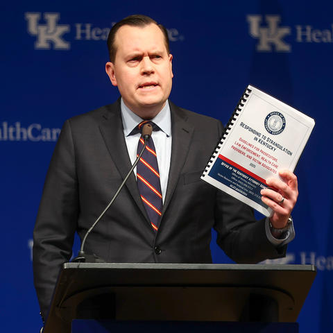 KY AG Coleman holding manual 