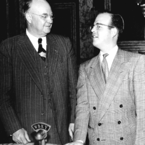 Gov. Clements on left and man on right in black and white