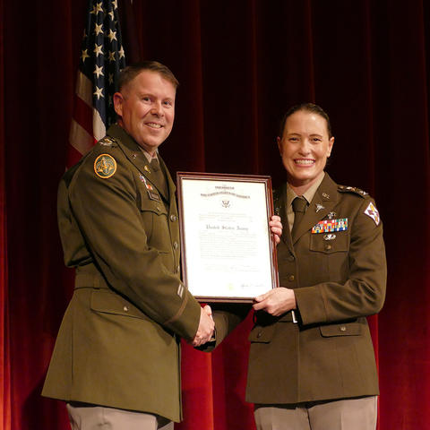 Photo of Col. Murray Receiving Certificate