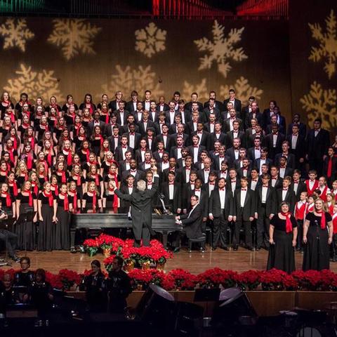 photo of full stage performance with 2 soloist, UK Choirs and Lexington Singers Children's Choir at "Collage"
