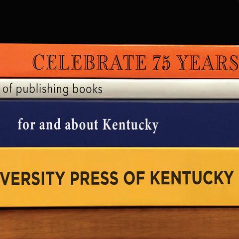 photo of 4 UPK book spines with info on 75th anniversary