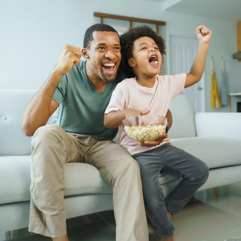 family cheering on a team 