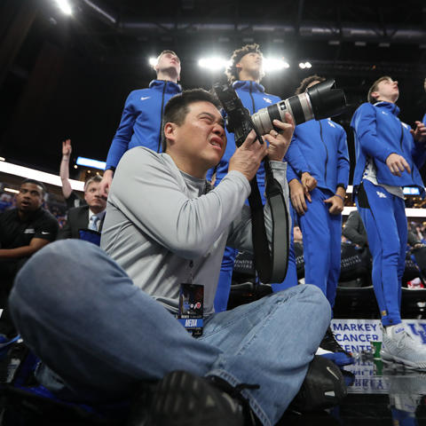 Michael Huang capturing photos at the UK  men's basketball game vs. Utah at the T-Mobile Arena in Las Vegas on Dec. 18, 2019.
