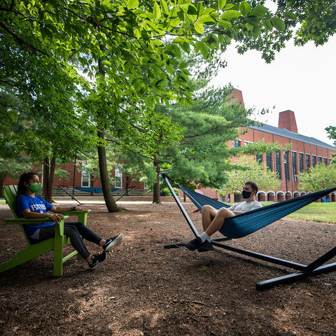 photo of students at hammock garden on UK campus