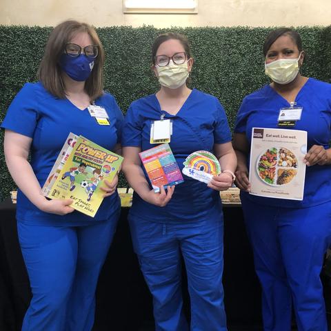 Nursing students with health promotion materials