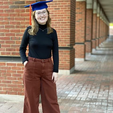 photo of Kyra Seevers wearing mortar board