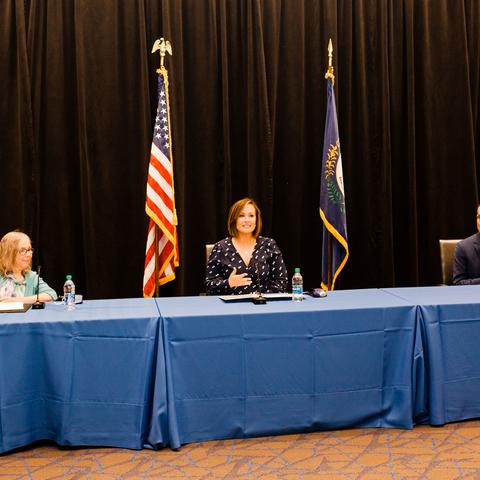 photo of RETAIN news conference speakers left to right: Human Development Institute Executive Director Kathy Sheppard-Jones; Lt. Gov. Jacqueline Coleman; and UK President Eli Capilouto sitting in front of mics at a table