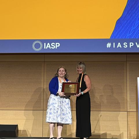 Photo of Julie Cerel Receiving Award