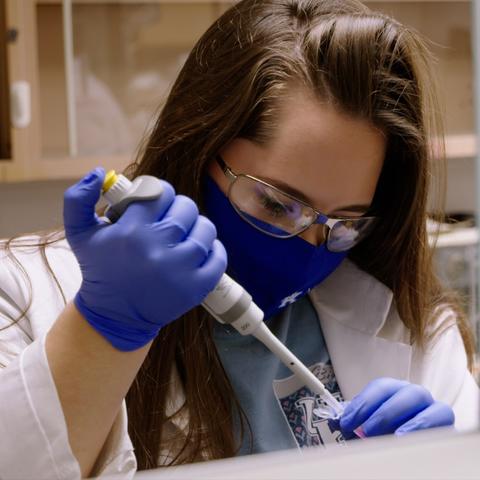 photo of Katie Land in research lab
