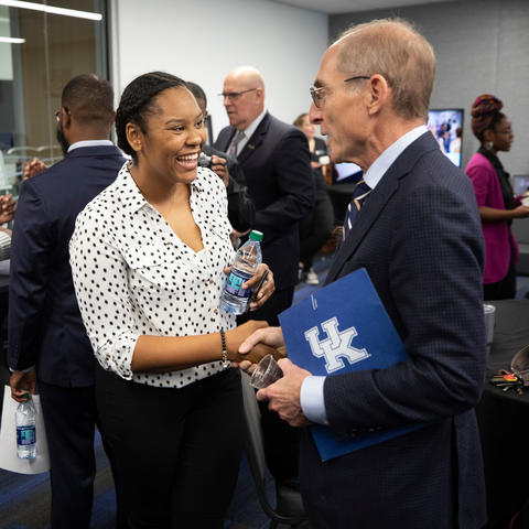 UK President Eli Capilouto greets UK senior Kamaria Campbell at the Martin Luther King Center Opening