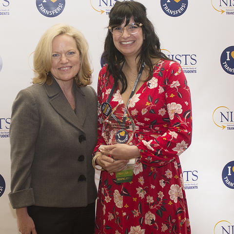 Dr. Janet Marling on left and Sara Price on right holding award
