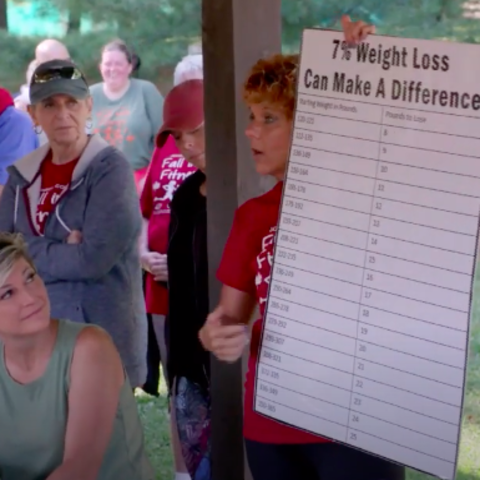 Mary Beth Castle leads a discussion about preventing diabetes at a community "Fall into Fitness" event. 