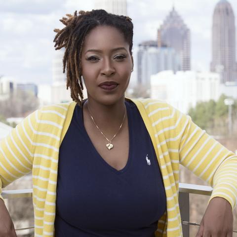 Simone Heath in front of Atlanta skyline
