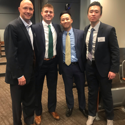 photo of Quint Tatro, Will Smith, Michael Zhu and Frank Zhang at Stock Pitch competition