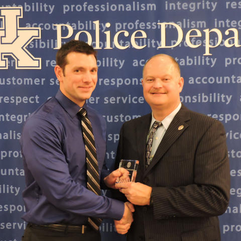 photo of UK Police Officer of the Year John Stanko with Chief Joe Monroe