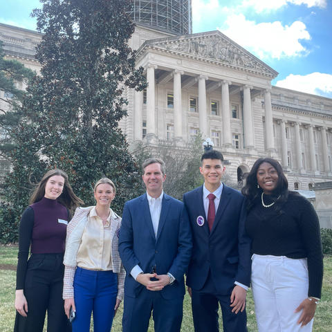 #iCANendthetrend Youth Advisory Board members and Governor Andy Beshear standing in front of the state capitol building in Frankfort