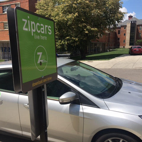 A Zipcar in its designated parking spot on Martin Luther King Boulevard