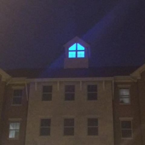 blue light on Haggin Hall