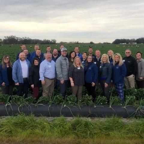 Members of Class 12 are pictured in a Florida strawberry field during a domestic learning journey in January 2020.