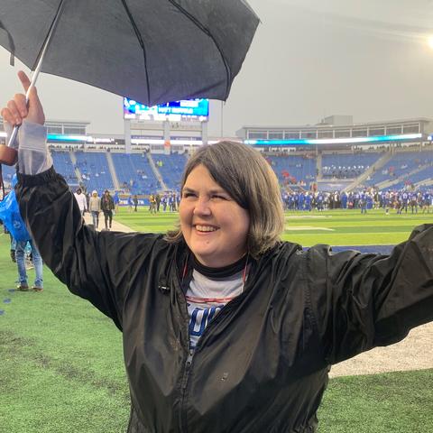Photo of UK alum Ouita Michel during recognition at Kroger Field
