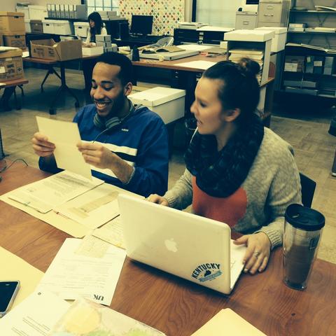 photo of 2 interns working in Special Collections Learning Lab