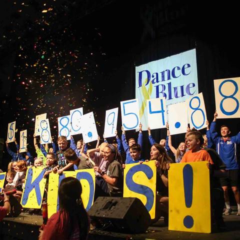 DanceBlue dancers and patients on stage