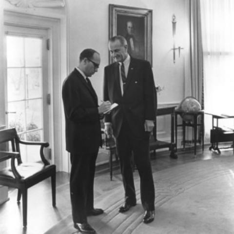 black and white photo of Sid Davis interviewing LBJ in White House