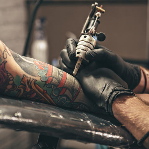 A new study finds that tattooed skin does not sweat as much as non-inked areas of the body | Photo from Getty Images.