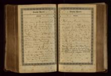 Open historical book with handwritten entries on aged pages, displayed against a dark background.