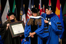 Nikky Finney is presented with an honorary degree at the December 2022 Commencement Ceremony