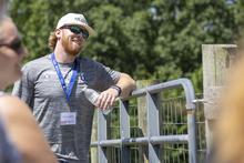 Brock Vandagriff listens to a presentation