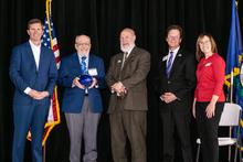 Robert Baumann receives Governor Service Award