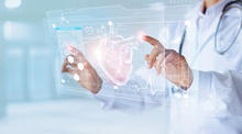 image of doctor interacting with digital image of a heart