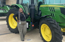 Jakayla Allen with tractor 