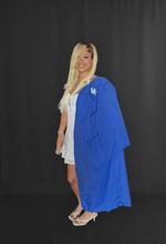 ShoShana White standing with her graduation gown. 