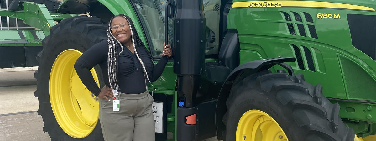 Jakayla Allen with tractor 