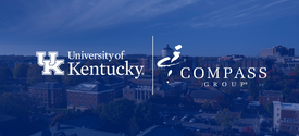  Kentucky and Compass Group logos over a blue‑tinted aerial view of campus buildings