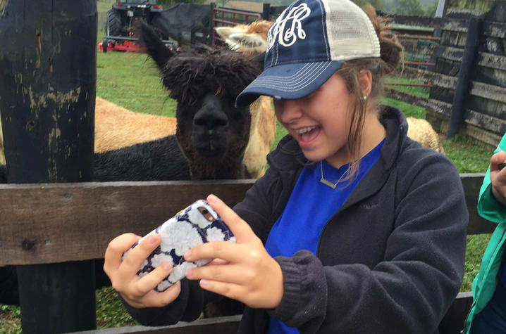 A selfie with an alpaca