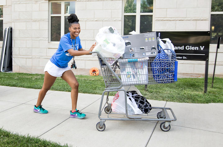 photo of student moving in to campus housing 