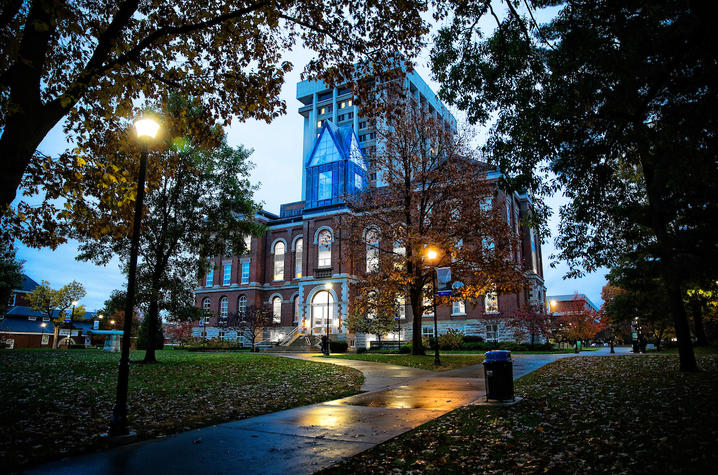 photo of UK Main Building in blue lights