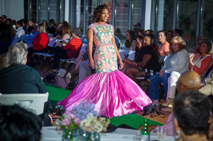 photo of student modeling dress in Color Me Spring fashion show