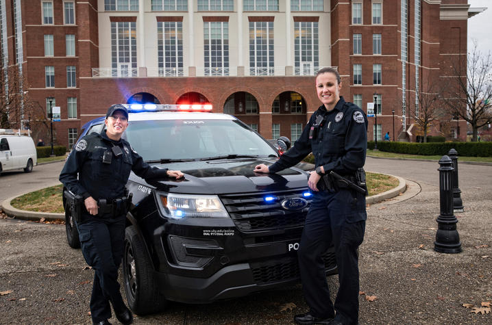 photo of UK Officers Andy Eilertson and Holly Williams 
