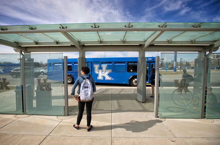 photo of person waiting for a bus