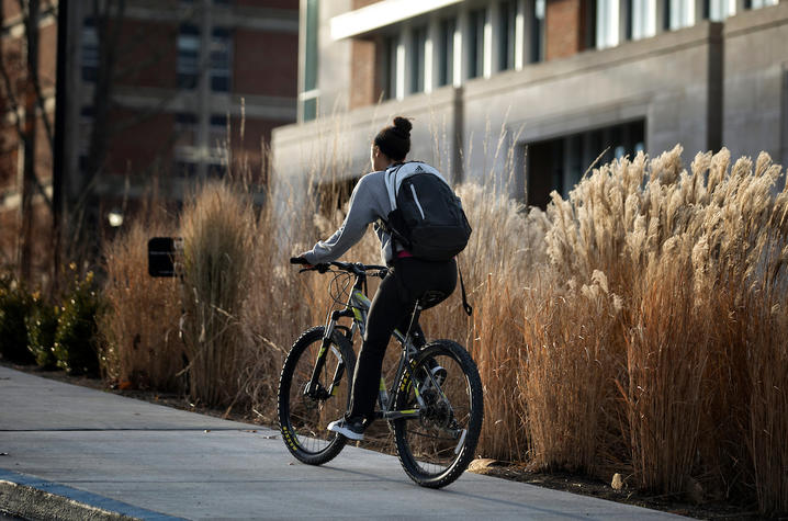 photo of girl on bike