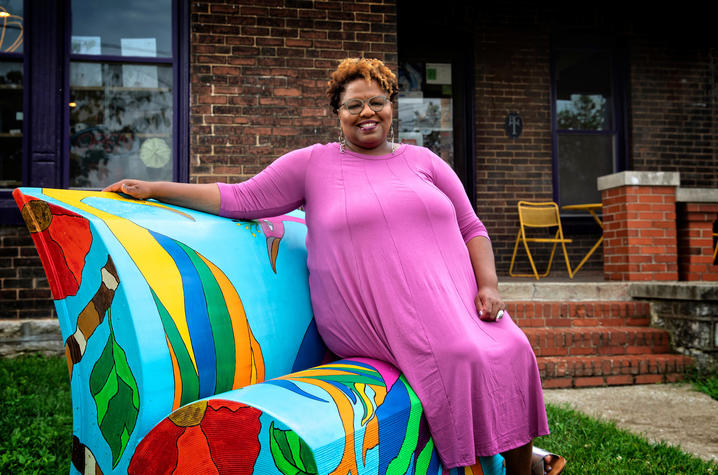 photo of Crystal Wilkinson seated on her book's bench