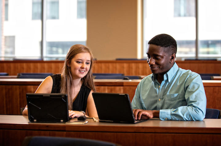 Two students using iPads