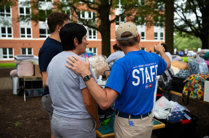 photo of President Capilouto directing a parent