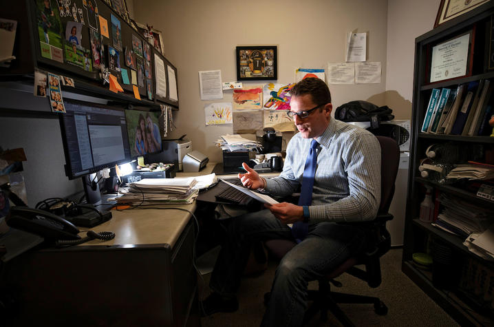 photo of Kevin Pearson working at desk